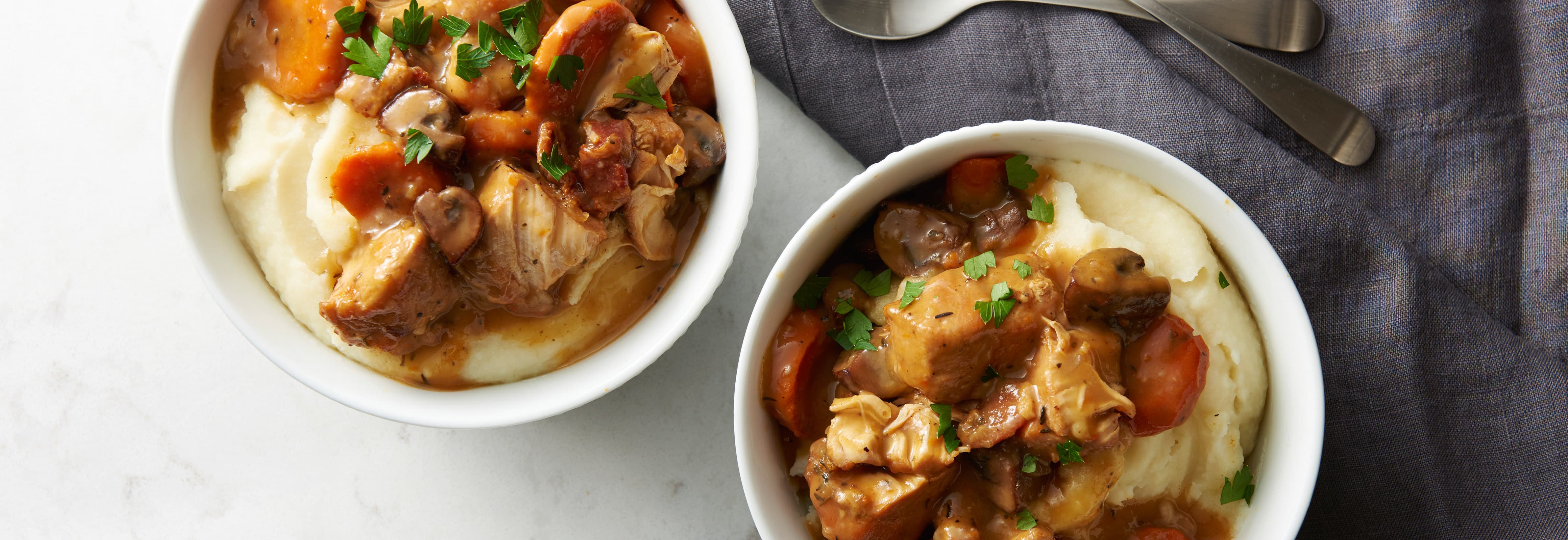 Slow-Cooker Chicken Burgundy Stew prepared recipe served in bowls